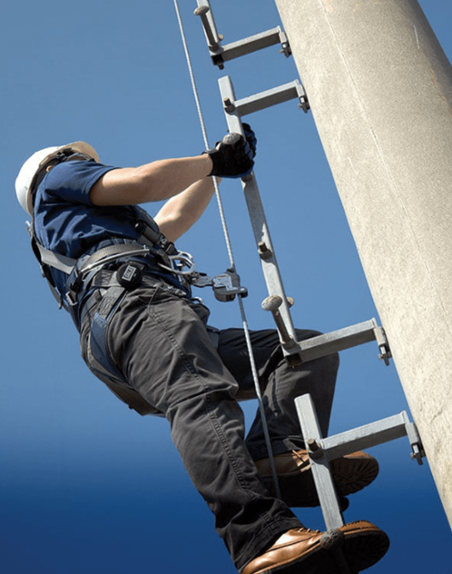 Male workers clear rope access wearing safety first harness rope